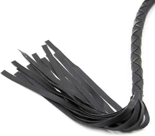 Close view of flexible black PU leather flogger tails