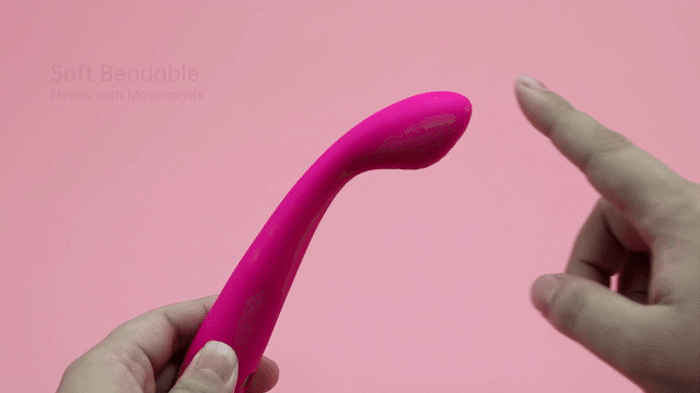 Hands demonstrating the flexible neck of the pink curved vibrator