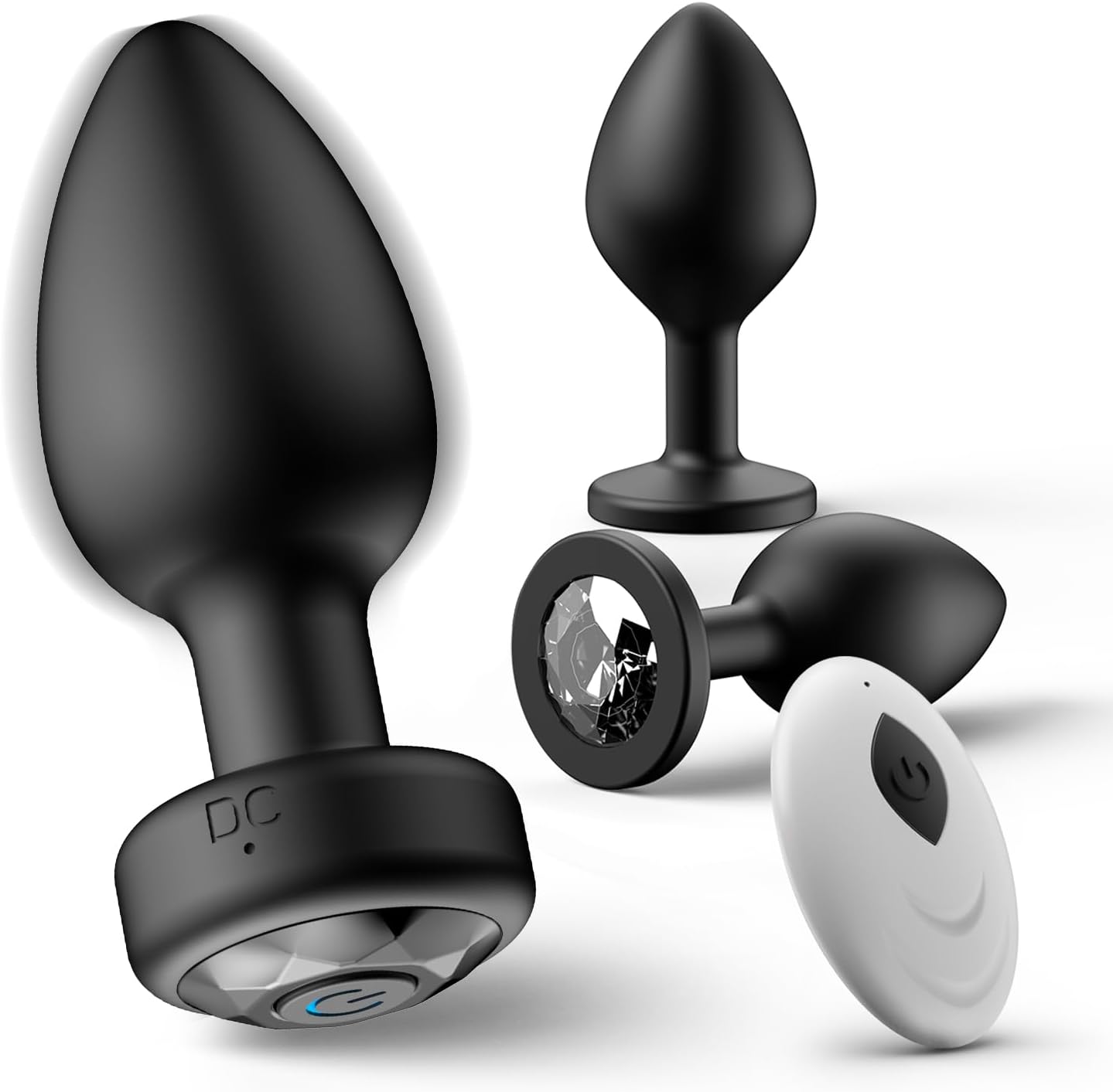 Black vibrating plug and remote with comparison plugs